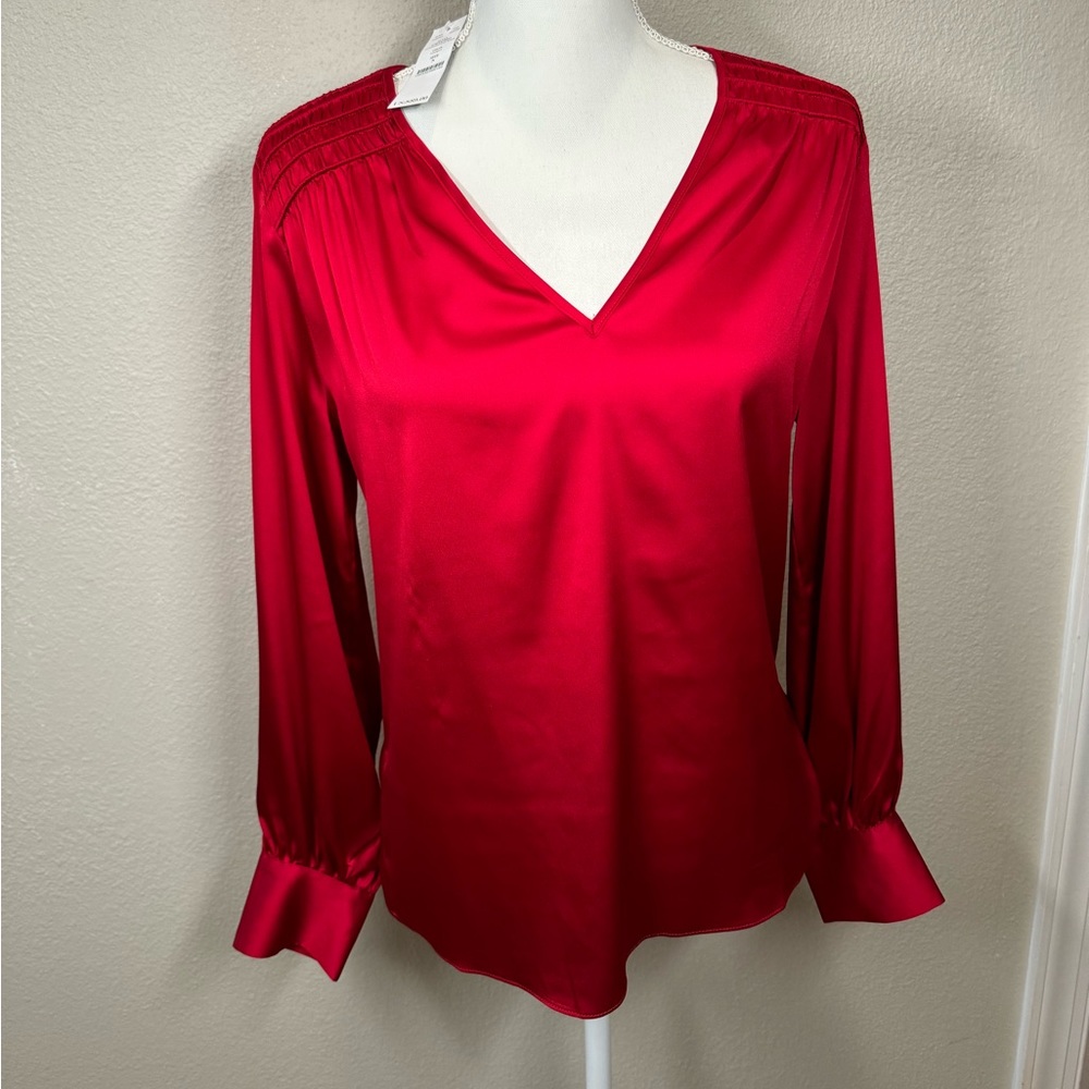 Long sleeved red blouse